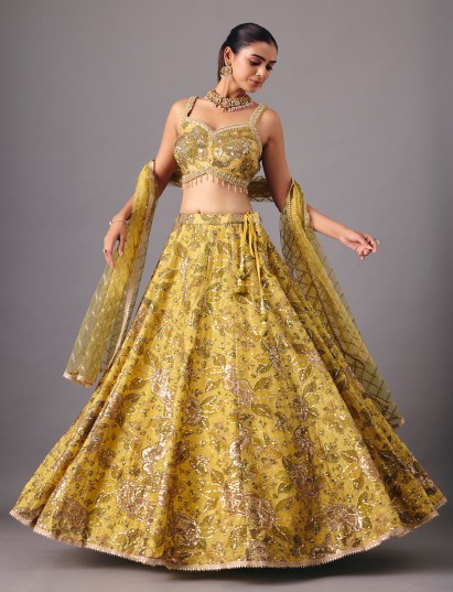 Mehendi yellow georgette silk lehenga choli with elegant embellishments