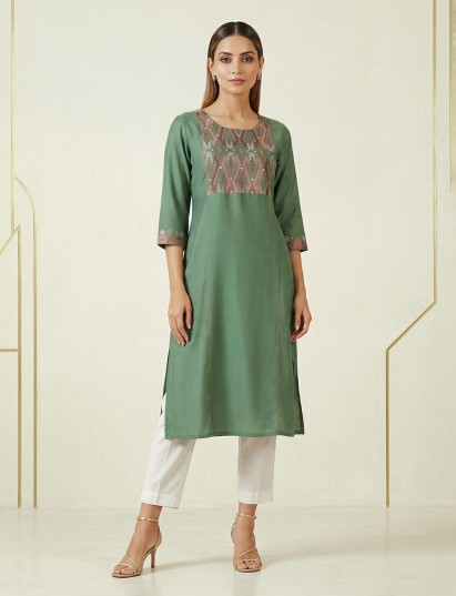 Pista green cotton silk geometric yoke kurti