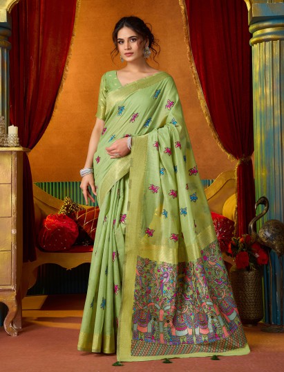 Pista green cotton linen saree with woven zari border