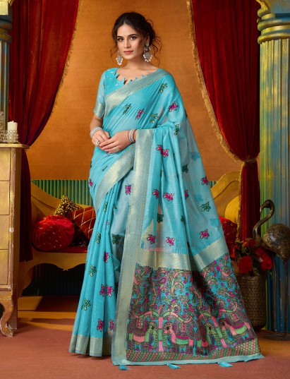 Sky blue cotton linen saree with elegant zari finish