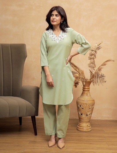 Pista green cotton kurti set with subtle embroidery