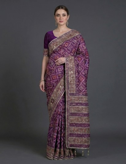 Purple art patola silk saree with intricate embellishments
