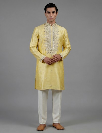 Yellow silk kurta set with aabla festive detailing