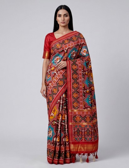 Wine patola silk saree with zari pallu accents
