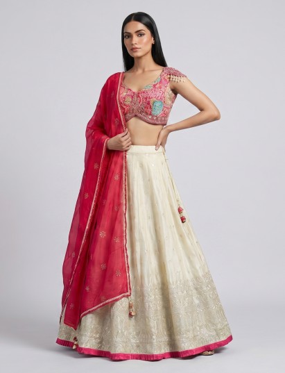 Rani pink cream silk lehenga choli with embellishments