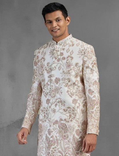 Sophisticated peach raw silk sherwani with garden inspired embroidery
