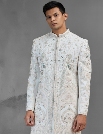 Royal cream silk sherwani with aqua peacock motif embroidery