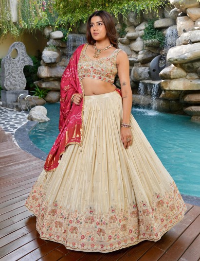 Cream satin silk lehenga choli with elephant motifs