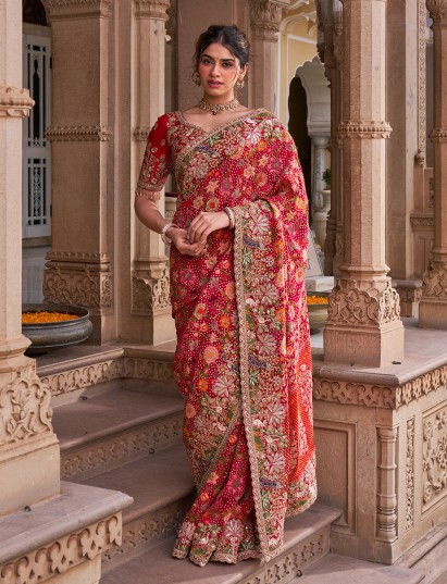 Fuchsia pink georgette saree with vibrant resham embroidery