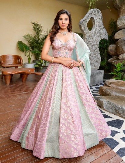 Pink mint brocade lehenga choli with colorful motifs
