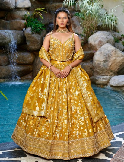 Mustard yellow brocade lehenga choli with zari detailing