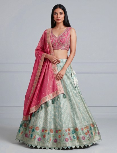 Sky blue silk lehenga choli with bird motifs