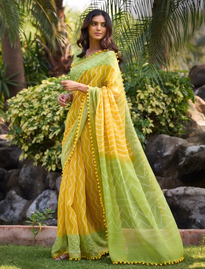 Mustard yellow malmal cotton saree with designer pum pum border