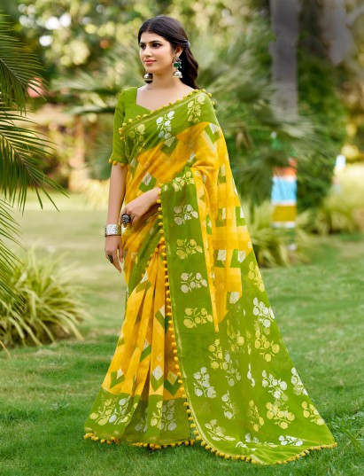 Mustard yellow malmal cotton saree with trendy pum pum accents