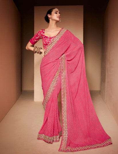 Bright pink bandhej malmal cotton festive wear saree with traditional charm