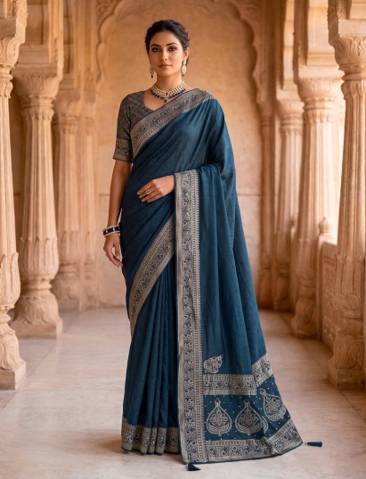 Teal blue dola silk saree with floral tassel designer work