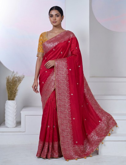 Red dola silk saree with traditional butti pallu work