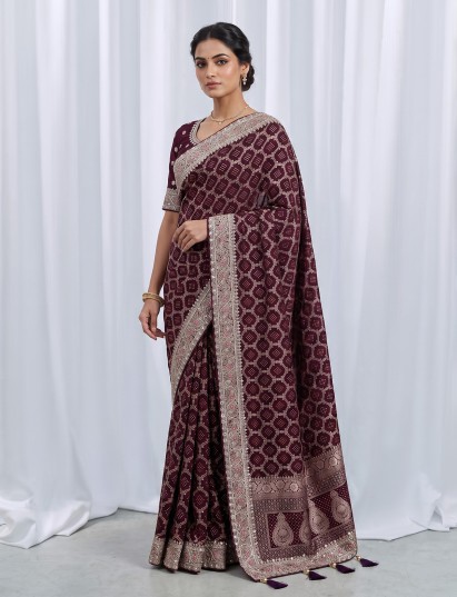 Wine bandhani semi georgette saree with elegant tassel pallu detailing
