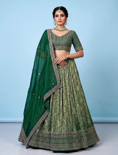 Green embroidered silk festive lehenga choli with dupatta