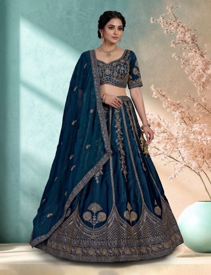 Peacock blue raw silk embroidered designer lehenga choli with dupatta