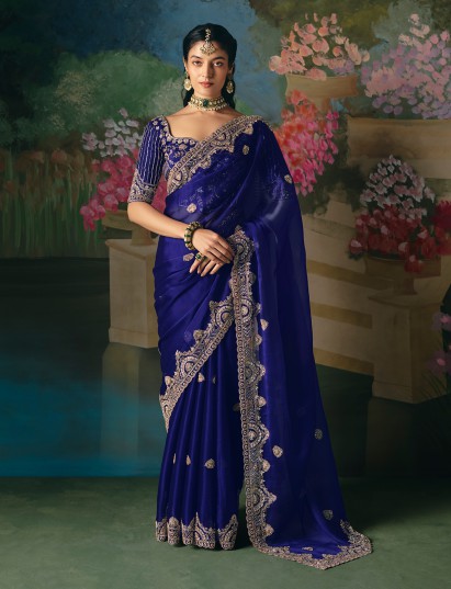 Blue chinon silk saree with heavy work blouse