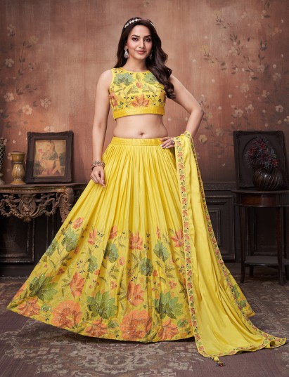 Yellow chiffon silk lehenga choli adorned with vibrant multicolor thread work