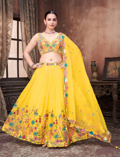 Yellow georgette lehenag choli with multicolor embrodery