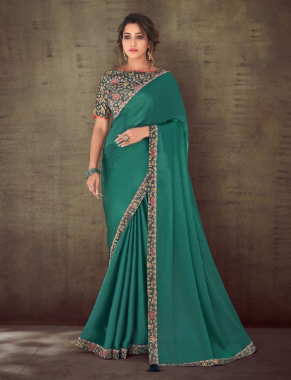 Green organza silk crepe embroidered party saree