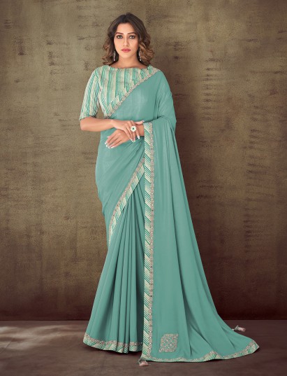 Mint green crepe georgette mirror work saree