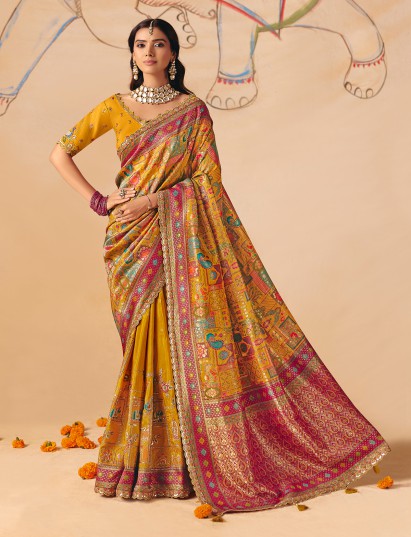 Yellow heritage peacock elephant handcrafted banarasi silk saree