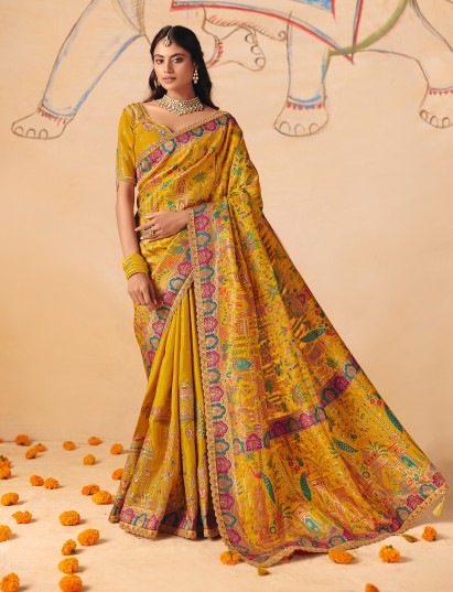 Yellow vibrant peacock cultural patola banarasi silk saree