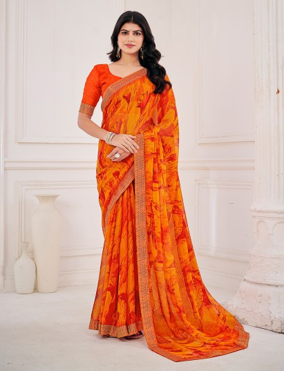 Orange printed zari work georgette saree for haldi