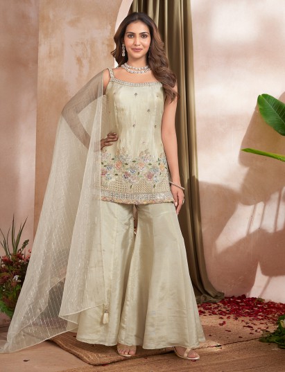 Cream embroidered punjabi style silk palazzo suit