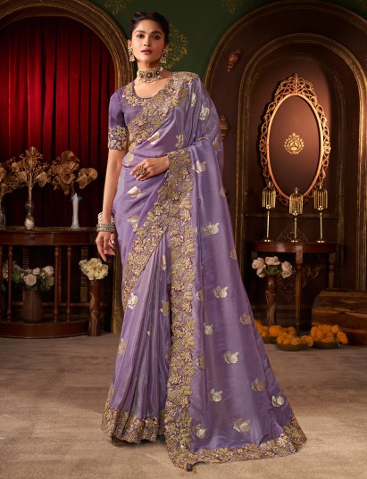 Light purple soft silk zari and embroidered work saree