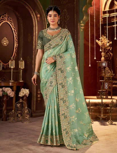 Pista green soft silk saree for wedding celebration