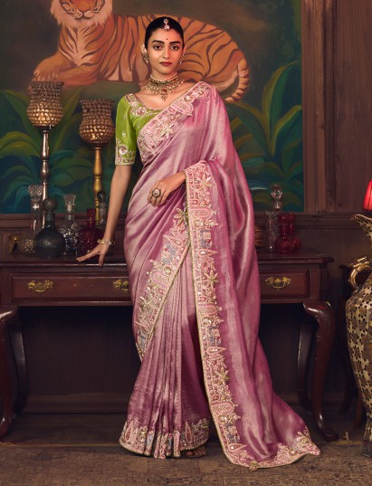 Pastel pink silk embroidered reception wear saree