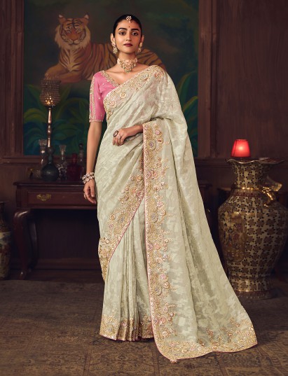 Cream silk embroidered saree for wedding wear