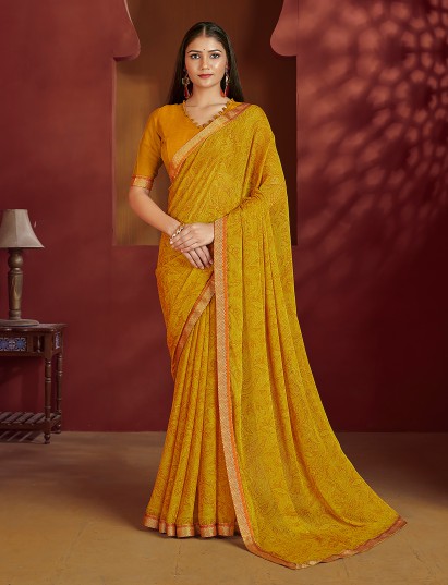 Yellow printed zari border chiffon saree