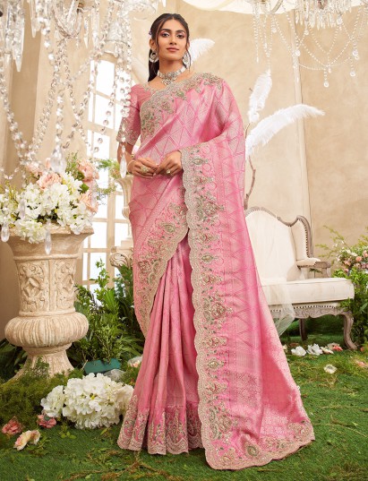 Pink viscose silk saree with ornate festive embellishments