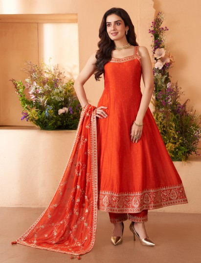 Orange silk salwar suit for bright festive allure