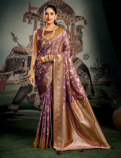 Purple silk saree adorned with delicate zari detailing