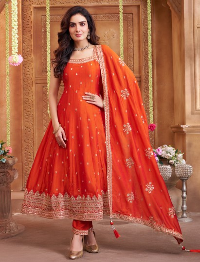 Orange salwar suit with stylish sleeveless pattern