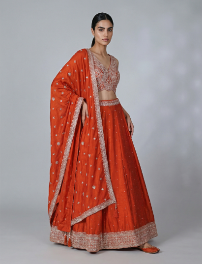 Rust orange silk embroidered lehenga choli