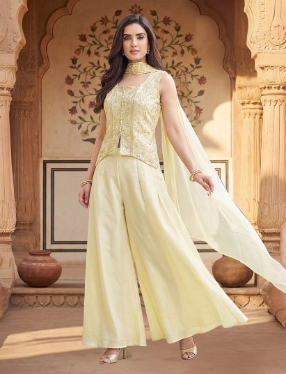 Cream silk palazzo suit with elegant embellishments