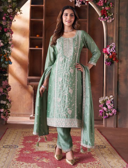 Pista green festive wear silk straight cut salwar suit