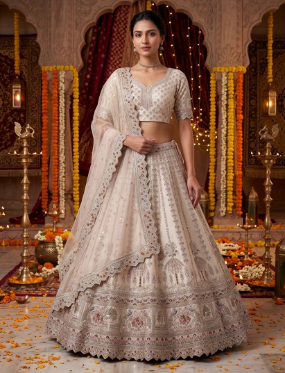 Beige embroidered tussar silk lehenga choli with dupatta
