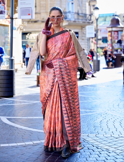 Light orange designer satin crepe festive printed saree