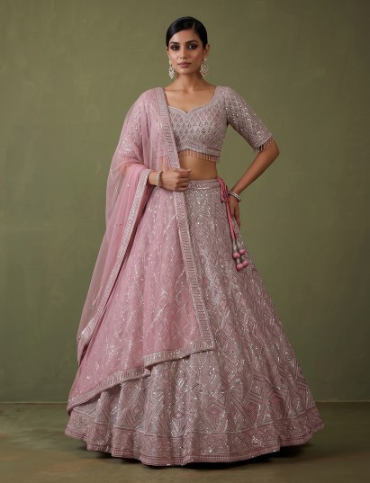 Onion pink embellished net lehenga choli attire