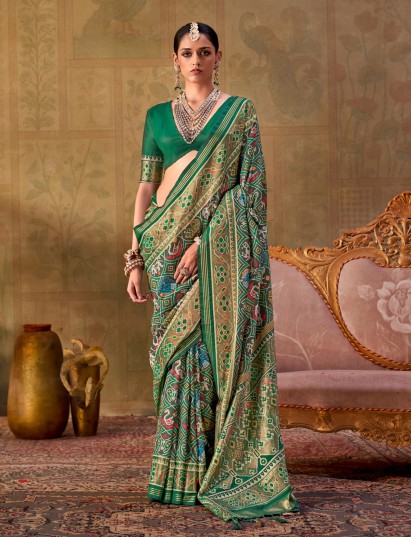 Green premium woven silk saree with blouse piece