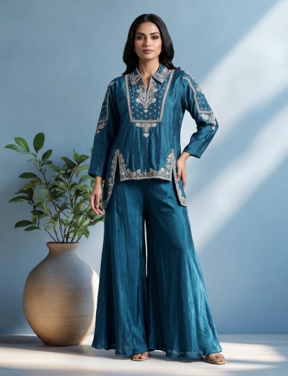 Blue designer silk sharara suit with contemporary asymmetrical style